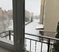 Шестиместный номер Economy с балконом и с красивым видом из окна в Дюна-центр