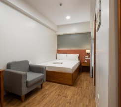 Двухместный номер Deluxe двуспальная кровать в Ihotel Uptown Bgc
