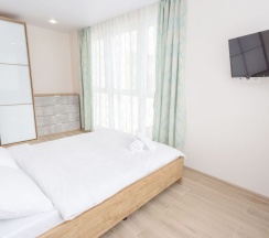 Номер Superior в Квартира на сутки Маяк Минск Метро 5 мин Wi-Fi Кондиционер Кухня объединена с жилой зоной Отдельная спальня Отчётные документы