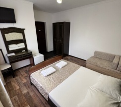 Номер с двуспальной кроватью в Киви