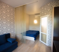 Четырёхместный номер Standard с балконом в Singer