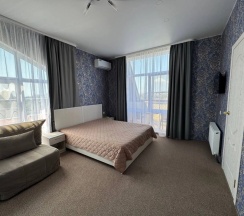 Двухместные апартаменты с террасой двуспальная кровать в Мелис