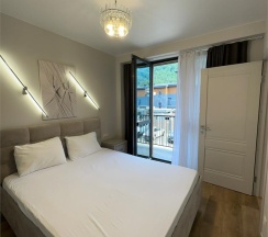 Апартаменты двухкомнатные четырехместные  (улучшенные) с балконом в Polikariya