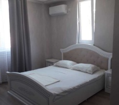 Четырёхместные апартаменты Deluxe с балконом и с красивым видом из окна в На переулке Терешковой