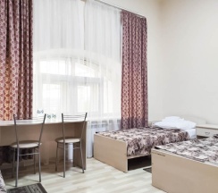 Кровать в 3-местном общем номере в Smart Hotel KDO Саранск