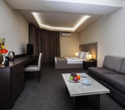 Четырёхместный семейный номер Deluxe в Отель Aviatrans