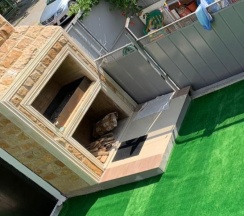 Стандартный семейный номер с 1 двуспальной и двухуровневой кроватью в Жемчужинка