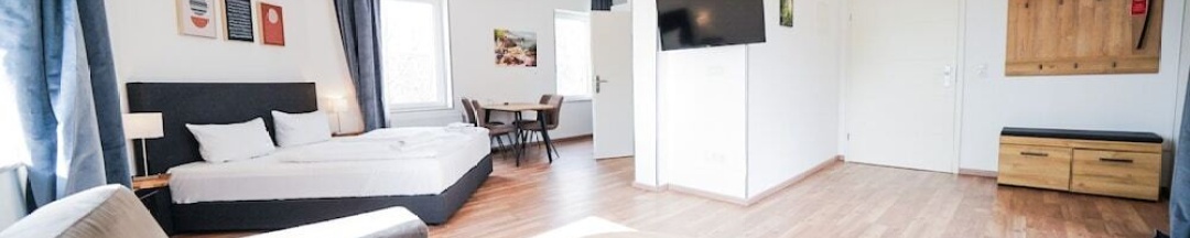 Двухместный семейный люкс двуспальная кровать в Hotel Zur Alten Stadtkellerei Leipzig