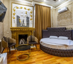 ДеЛюкс с круглой кроватью в Мартон Сказка