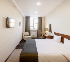 Стандарт с большой кроватью king size в Бенефит Плаза