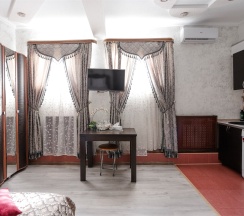 Студия-улучшенный двухместный номер с двуспальной кроватью в Олимпия