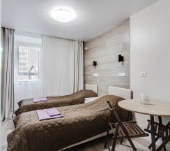 1-комнатные апартаменты студия с 2 односпальными кроватями в Home Like (Хоум Лайк) на бульваре Эйнштейна 4