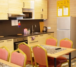 Кровать в четырхместном номере в Якорная