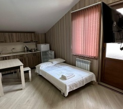 Номер студия семейный (мансарда) в Лиана
