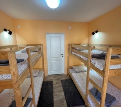 Кровать в общем номере (мужской номер) в Гостевой Дом 125