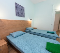 Двухместный номер Семейный Эконом 2 отдельные кровати в Вкс