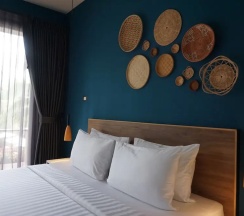 Двухместный номер Deluxe с видом на бассейн двуспальная кровать в Signature Phuket Resort