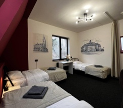 Кровать в 3-местном общем женском номере в Прусс