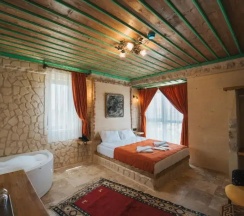 Двухместный люкс двуспальная кровать в La Casa Cave