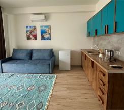 ПОЛУЛЮКС с патио и видом на море в Santorini Family Club