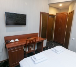 Стандартный номер с 1 или 2 отдельными кроватями в Аврора