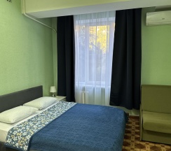 Номер эконом с 1 двуспальной кроватью в на Комсомольской