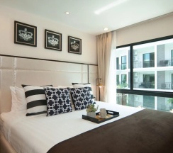 Люкс Comfort c 1 комнатой с видом на бассейн в The Title KR Beach Condotel Rawai Phuket
