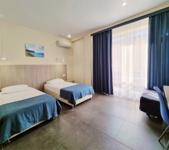 Улучшенный Стандарт с двумя кроватями SUTWIN (с балконом) в Heliopark Aqua Resort
