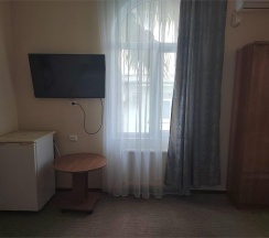 Номер стандарт с 1 односпальной и 1 двуспальной кроватью в Оптима