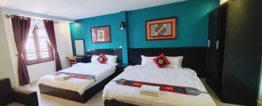 Двухместный семейный номер Standard двуспальная кровать в Sapa New Orient Hotel
