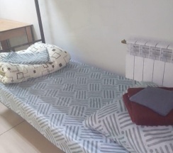 Кровать в 10-местном общем номере в Сити-В