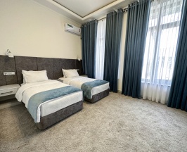 Двухместный номер Standard 2 отдельные кровати в Отель Shohjahon Palace