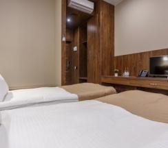 Двухместный номер «ДЕЛЮКС» с двумя отдельными кроватями в Riverside Hotel