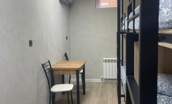 Кровать в 4-местном общем мужском номере в На Лечебной