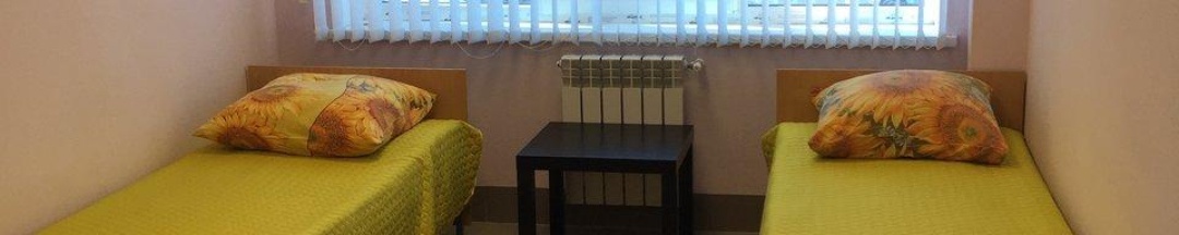 Кровать в 3-местном общем номере в Мотель
