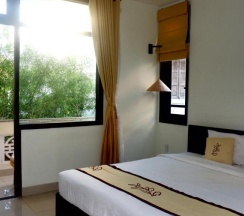 Двухместный номер Deluxe с балконом двуспальная кровать в Hoi An Cottage Villa