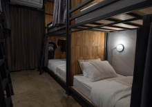 Кровать в общем номере в Sleepcase Hostel