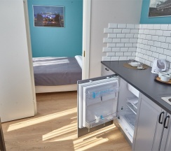 Большой двухкомнатный номер с отдельной спальней и кухней в Port inn