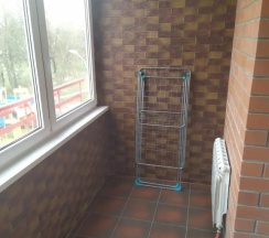Номер Standard с балконом и с красивым видом из окна в Апартаменты Коммунистическая 25