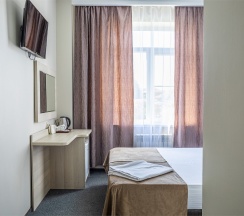 Cтандартный номер с двуспальной кроватью в Мартон Шолохова