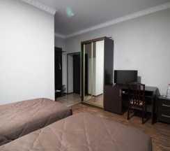 Номер стандарт с 2 односпальными кроватями в Таурух