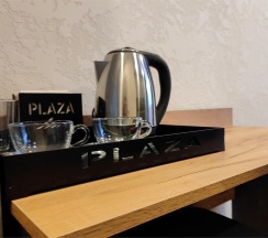Кровать в 2-местном общем номере в Hotel Plaza+