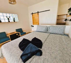 Двухместное бунгало Superior рядом с пляжем двуспальная кровать в Secret Beach Bungalows