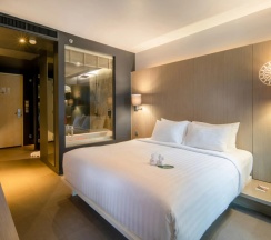 Двухместный номер Superior с балконом и с видом на море двуспальная кровать в Отель The Yama Resort & Spa Kata Beach Phuket