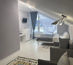 Четырёхместный номер Улучшенный с красивым видом из окна в В моменте