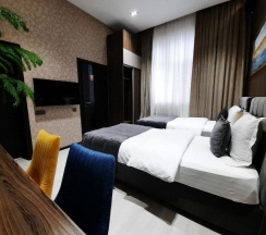 Номер Luxury в Home Hotel