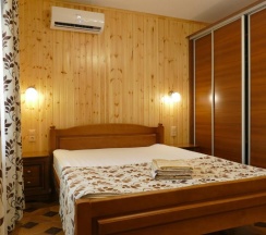 Четырёхместный номер Standard с балконом в Гагра