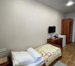 Кровать в 5-местном общем номере в Касальта