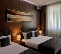 Двухместный номер Deluxe 2 отдельные кровати в Home Hotel