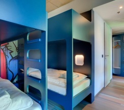 Кровать в общем номере (женский номер) в MEININGER Hotel Berlin East Side Gallery